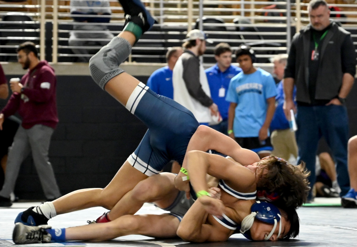 Keagan Mesina from Mater Lakes Academy advances to the finals with a win over Jose Cordero from Cleveland during a 106-pound semifinals match on Saturday at the Knockout Christmas Classic at Silver Spurs Arena in Kissimmee. 